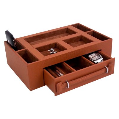 Leather Valet Box With Pen and Watch DrawerOpen-face valet case Tan leather with pigskin lining 1 spacious drawer 7 divided storage slots on top Drawer holds 2 watches and 3 pens Measures 11W x 7D x 3H inches